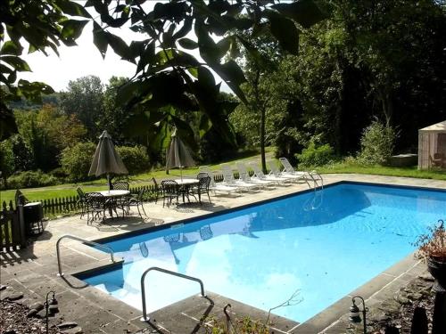 Secluded Cottage Rental with a Heated Pool in Red Hook for Family Getaways in New York State in Pine Plains