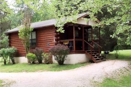 Riverfront Vacation Rental with Gas Fireplace in Eureka Springs, Arkansas · Busch