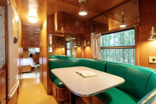 Gorgeous Fully Restored Caravan Nestled in the Trees Along Silver Lake for a Unique Vacation in Wood in Mountain Dale