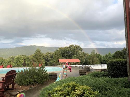 Swimming pool, Cozy Cabin Rental and Cowboy Experience at a Tennessee Dude Ranch in Dunlap (TN)