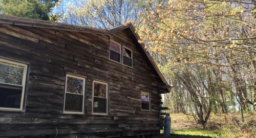 Rustic Cabin on Sturdivant Island with Views of Casco Bay in Falmouth, Maine · Royal Junction
