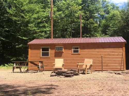 Pennsylvania Glamping Destination for Nature Getaways for Four in Charming Log Cabin