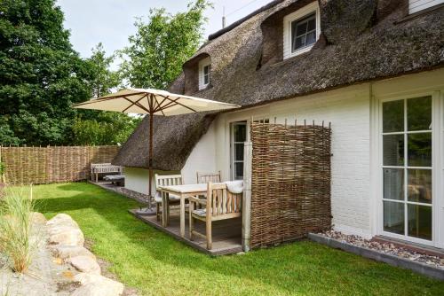 Hus am Wall - Reetdachapartments - St. Peter Ording in Sankt Peter-Ording