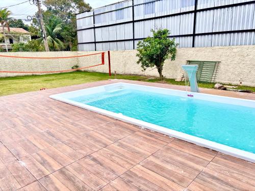 Svømmebasseng, Casa Colonial Recanto da Família & Amigos e Kit Anexa! (Casa Colonial Recanto da Familia & Amigos e Kit Anexa!) in Balneario das Conchas