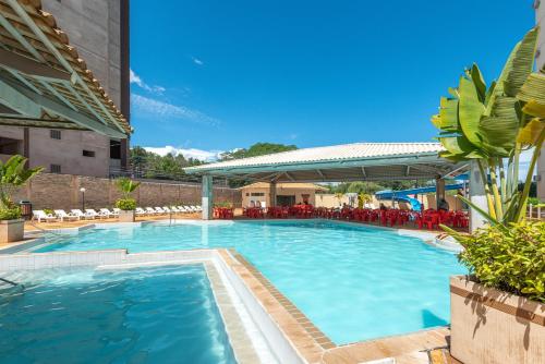 Swimming pool, diRoma Villas direto com o Grupo diRoma com acesso ao Acqua Park e Cafe da manha in Prive das Caldas