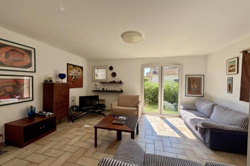 Charmante maison avec balcon et jardin
