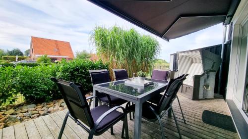 Balkons/terase, Zauberhafte Ferienhaushälfte Küstenliebe am Sehlendorfer Ostseestrand (Zauberhafte Ferienhaushalfte Kustenliebe am Sehlendorfer Ostseestrand) in Blekendorf
