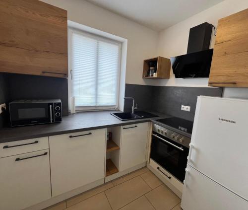 廚房, Ferienwohnung Auszeit am Schlossberg in 迪波爾迪斯瓦爾德