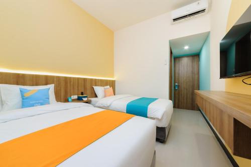 Sans Max Living Tangerang Room Type - Superior Twin Room