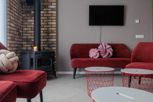 Koplietošanas atpūtas telpa ar TV, Sabos Rezidencija Private Countryside Villa near Vilnius in Semeliškės