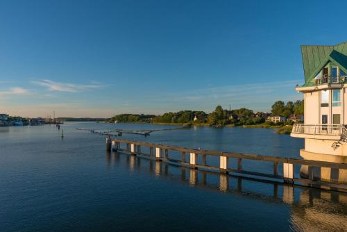 Aktivitäten, Harbour Lodge: Meerblick, Terrasse, Balkon, finnische Sauna, Kaminofen in Olpenitz