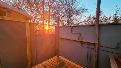 Camp Naledi - Exclusive Safari Tented Lodge with River View I Natural Plunge Pools I All Inclusive I in Ngwala