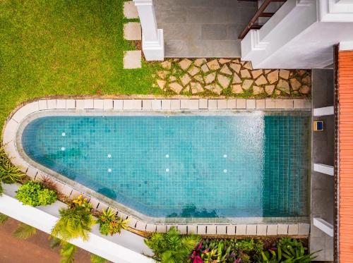 La Morella - 4BHK Luxury Villa in Assagao with Private Pool, Garden, Balcony, Caretaker, Kitchen, Genset Backup, Security