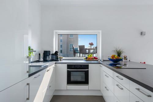 Kitchen, Miramar - Familienfreundliche Ferienhaus im OstseeResort Olpenitz in Olpenitz