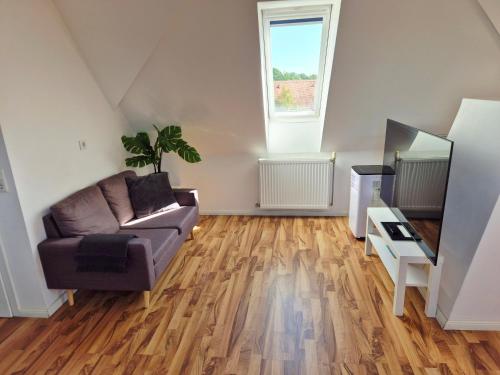 Dachgeschosswohnung 1 - Apartments am Schloss in Oberschleißheim, Deutschland