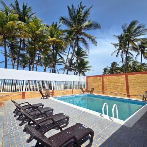 Swimming pool, Tucacas, Frente al Mar, Vista a la Piscina y Playa Privada in Boca de Aroa