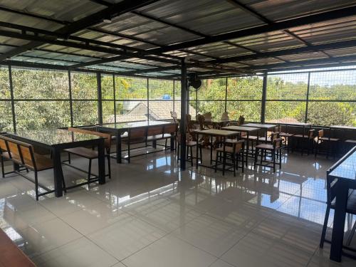 Empire One Bedroom with Common Pool in Muttil