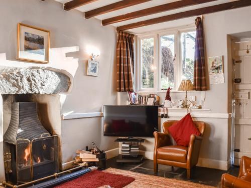 Tarn Cottage - Tap to explore photos