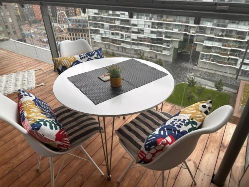 Balcony/terrace, Modern condo in Mall of Tripla in Pasila