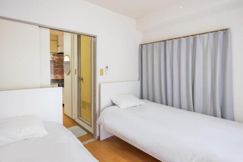 Ikebukuro 8 min walk, Kanamecho 6 min walk, 25sqm room, 2 guests, Direct access to Shinjuku, Shibuya, Tokyo, Ueno, 2 single beds