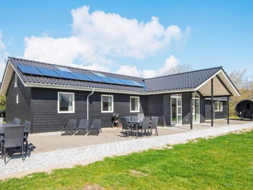 Vista exterior, Summer house with pool, sauna in Romo Kirkeby