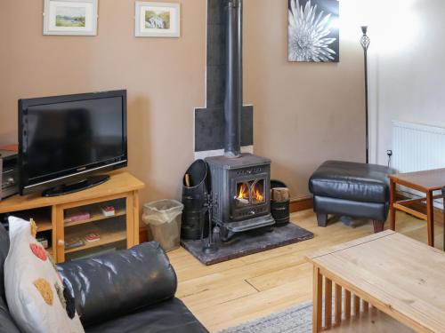 Viesnīcas āriene, Ty'n Cae Cottage in Llangristiolus