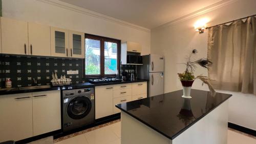 Konyha, 3 BHK Villa in Arpora with Pool access,5 Mins to Baga in Candola