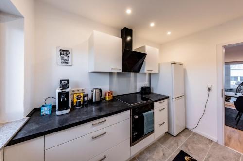 Wyposażenie, Serviced-Apartment mit Büro-Setup (Serviced-Apartment mit Buro-Setup) in Schwalbach