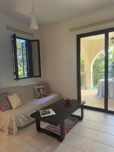 Tranquil Poolside apartment with stunning views in Mazotos