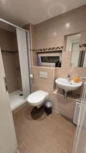 ห้องน้ำ, Modernes & gemütliches Apartment gegenüber dem Deister (Modernes & gemutliches Apartment gegenuber dem Deister) in บาร์ซิงเฮาเซิน