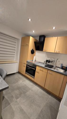 ห้องครัว, Modernes & gemütliches Apartment gegenüber dem Deister (Modernes & gemutliches Apartment gegenuber dem Deister) in บาร์ซิงเฮาเซิน