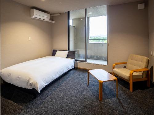 KANEMITSU CAPITAL HOTEL Room Type - Deluxe Double Room