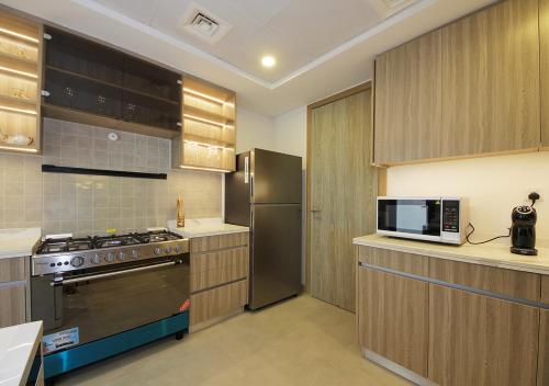 Cucina, Silk Valley - 4B near Al Hamriyah | Private Pool in Umm Al Quwain
