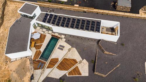 สระว่ายน้ำ, Villa Simone Lajares - 5 chambres - Piscine chauffée (Villa Simone Lajares - 5 chambres - Piscine chauffee) in ลาคาเรส