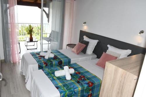 Duplex Rose Porcelaine - Vue Mer- Malendure in Bouillante