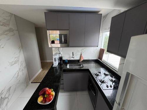 Casa com piscina e área Gourmet (Casa com piscina e area Gourmet) in ชารดิงโมราดาดาอัลเดยา