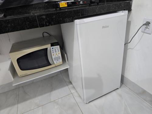 ห้องครัว, Flat completo 15 com ar condicionado e colchão confortável (Flat completo 15 com ar condicionado e colchao confortavel) in อะปาร์เรซิดา เดโกยาเนีย