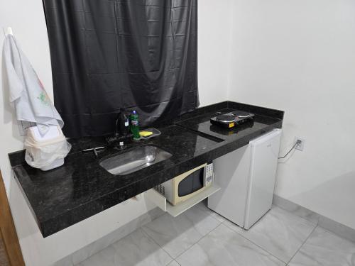 ห้องครัว, Flat completo 15 com ar condicionado e colchão confortável (Flat completo 15 com ar condicionado e colchao confortavel) in อะปาร์เรซิดา เดโกยาเนีย