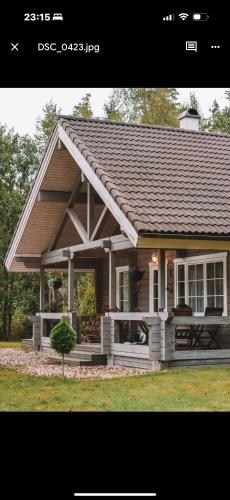 Merineitsi peamaja saunaga kahele - Location saisonnière - Tahkuna