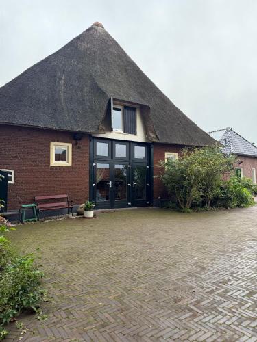 Onder de paardenkastanje in Empe