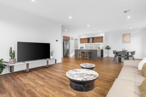 Bright & Roomy 5BR Clyde North Home in Cardinia