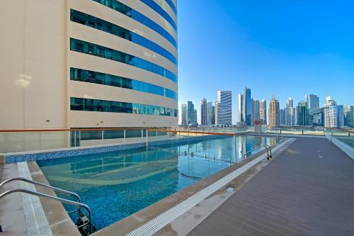 Cozy Studio with Burj Khalifa & Canal Views - image 8