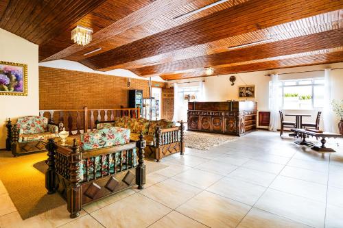 Lobby, VELINN Pousada Flores do Capivari in Campos Do Jordao