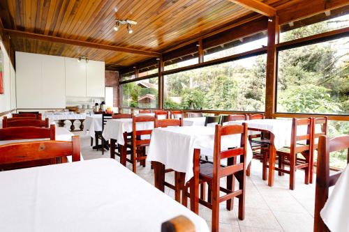 Restaurant, VELINN Pousada Flores do Capivari in Campos Do Jordao