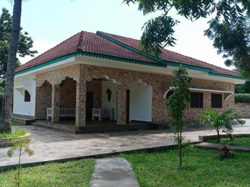 villa niha – khách sạn tại Uyombo