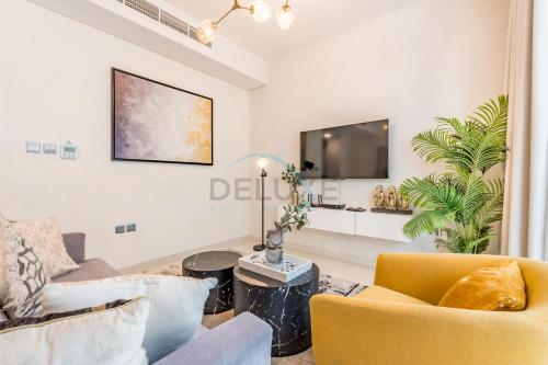 Furnished 3-Bedroom Townhouse, Just Minutes Drive from Al Marmoom Heritage Village and Popular Dubai Attractions, Albizia, Damac Hills 2 by Deluxe Holiday Homes, Dubai (foto 8)