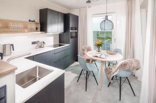 廚房, meer suite juist 2 - mit Infrarotsauna und Fitnessraum in 尤斯特
