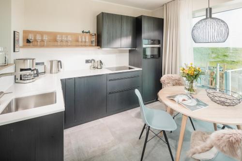 廚房, meer suite juist 2 - mit Infrarotsauna und Fitnessraum in 尤斯特