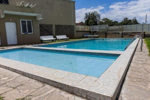 1BR Luxury Apartment Milimani Nakuru Empiris with Pool Gym Near Golf Club - image 5