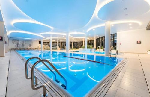 Apartament Polanki Aqua SPA Deluxe Nielimitowany dostęp do basenów darmowy parking – khách sạn tại Radzikowo